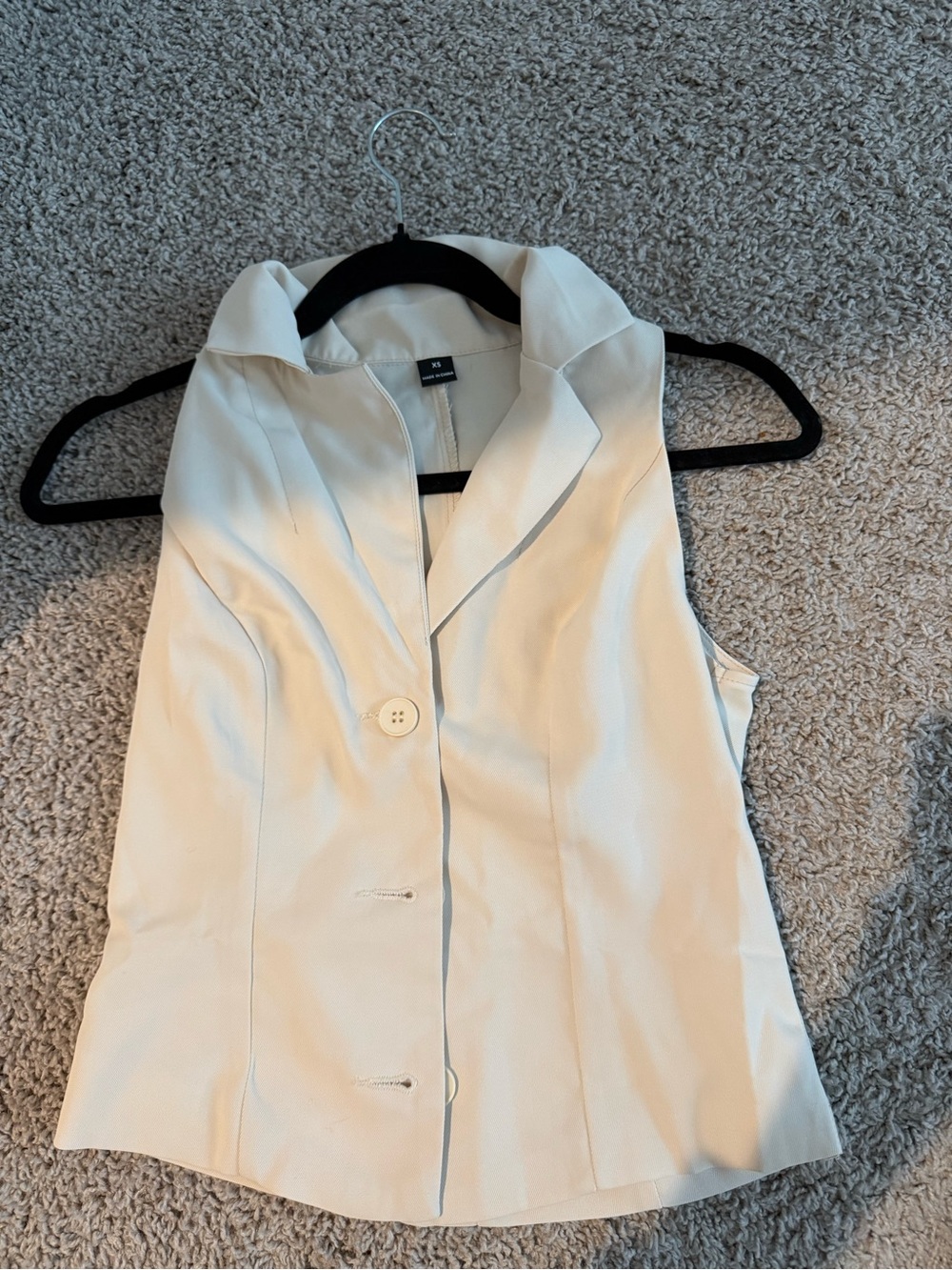 Biz Chic Women's Apricot Sleeve less Collared Top And White Pleated skirt